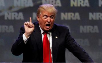98628728_Republican_presidential_candidate_Donald_Trump_addresses_members_of_the_National_Rifle_Asso-large_trans++eo_i_u9APj8RuoebjoAHt0k9u7HhRJvuo-ZLenGRumA